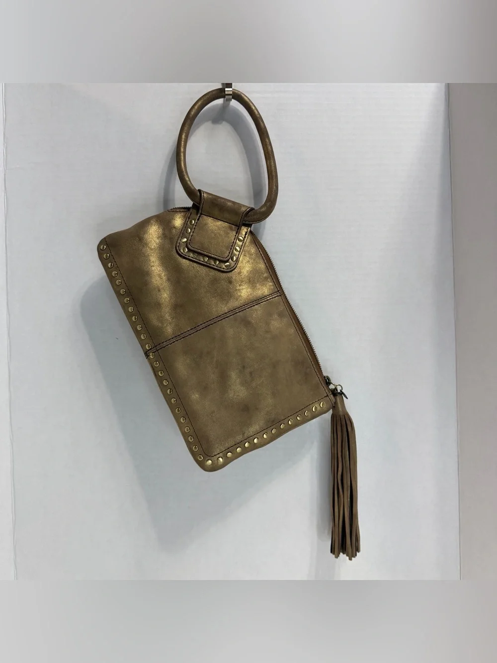HOBO Metallic Bronze Studded Wristlet Tote with Tassel